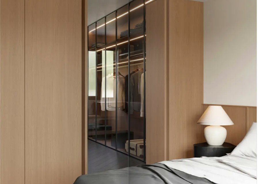 Bedroom with warm wood wardrobe panels